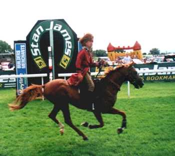 Jerry riding Kaan past the winning post at Bath Races