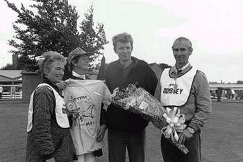 Alan presents Alison Dawes with flowers and a T-shirt